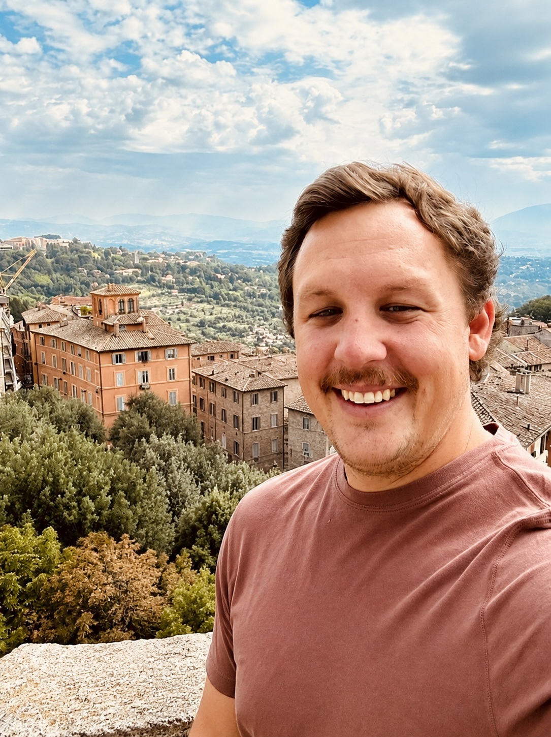 Warm portrait of founder Luke Pancoe in Florence